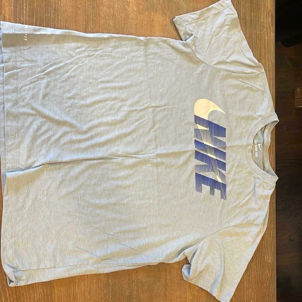 Large light blue nike shirt